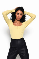 Soft Yellow Sweetheart Neckline Long Sleeve Bodysuit