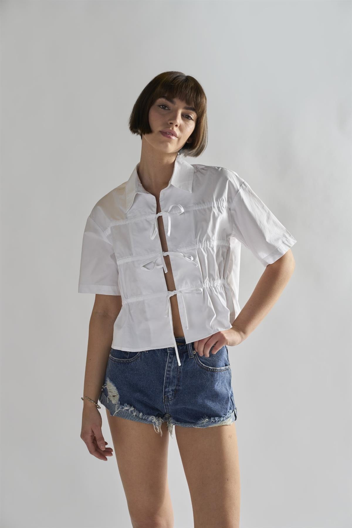 Mid-Stonewash Ripped Denim Shorts